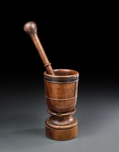 Large wooden mortar with guaiac pestle
19th...
