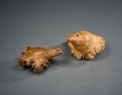 Two mushroom-shaped boxwood figures of a...