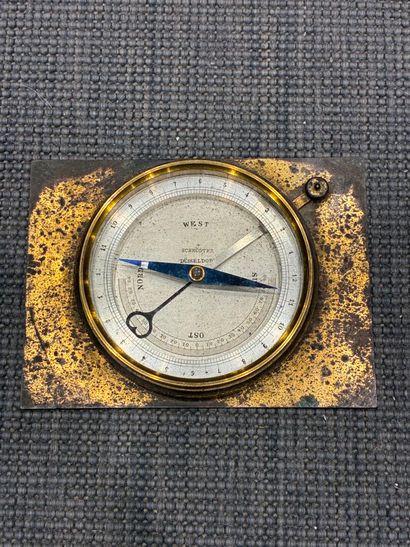 Brass compass marked 