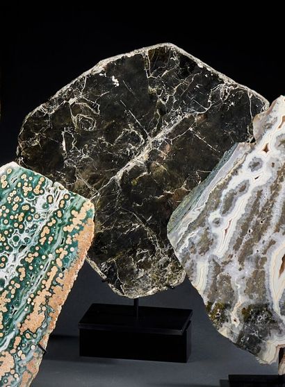 Gilded phlogopite mica crystal on steel base
H....