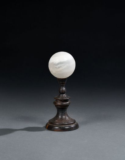 Quartz ball on turned wooden base
H. 18 ...