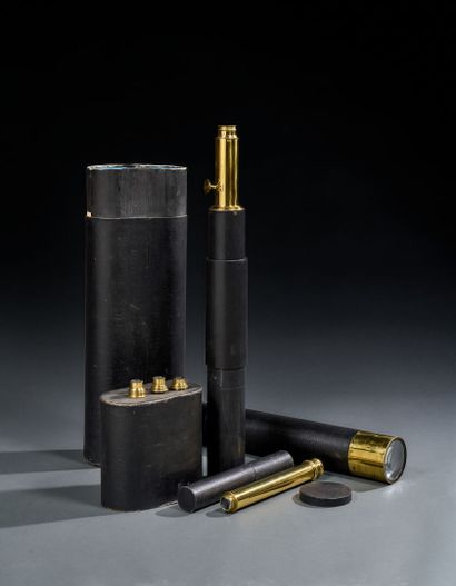 Curious brass and cardboard telescope in...
