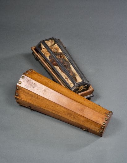 Wooden and brass coffin closed by four hooks...