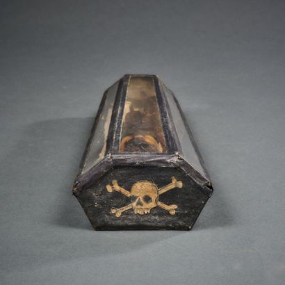 Wooden and brass coffin closed by four hooks...