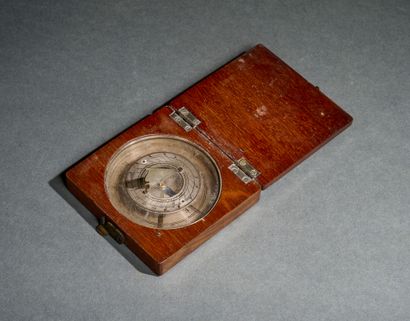 Small wood and metal sundial with single...