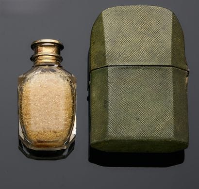 Faceted glass salt flask
Gilt-edged frame...