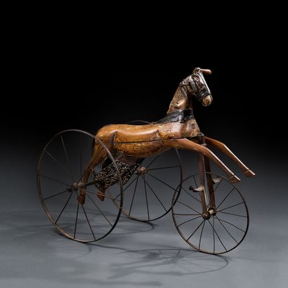 Wooden and cast-iron horse tricycle
Chain-driven...