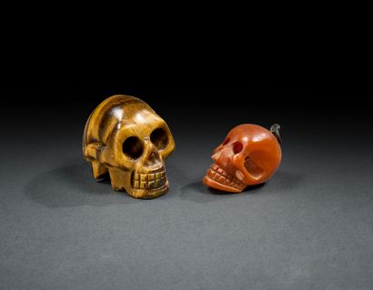 Set of two hard stone Memento mori (tiger's...