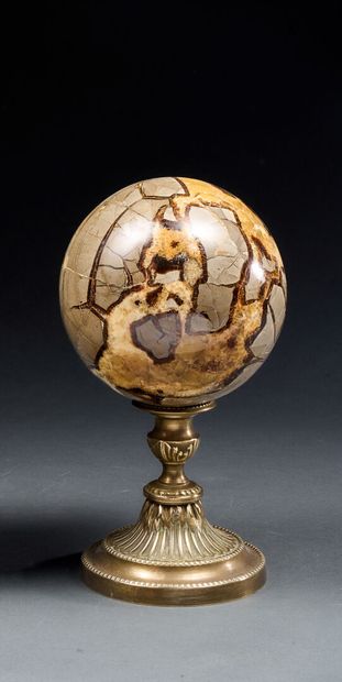 Septaria and yellow calcite ball mounted...