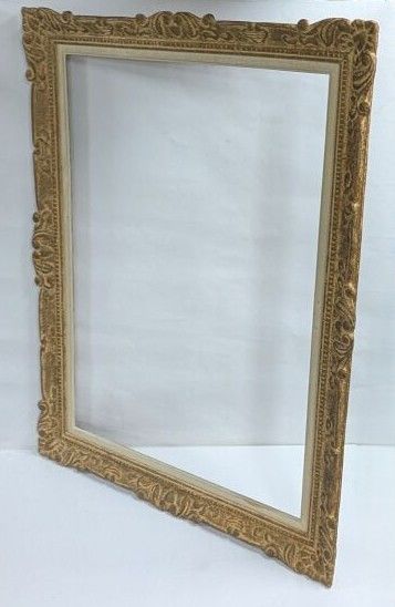 Wooden frame with painted stucco, decorated...