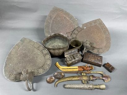 Souvenirs from trips to Asia and Iran, such...