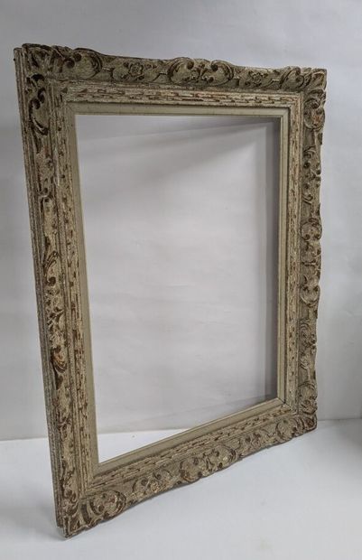 Carved wooden frame with Bérain decoration...