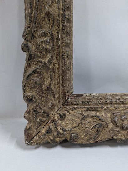 Wood and stucco frame decorated with palmettes...