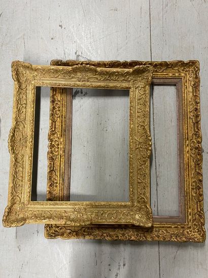Set of two wooden and stucco frames decorated...
