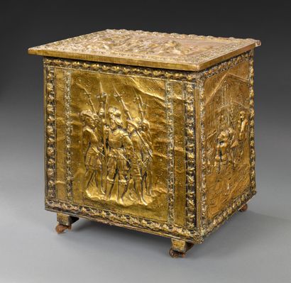 Wooden log chest with embossed brass plates...