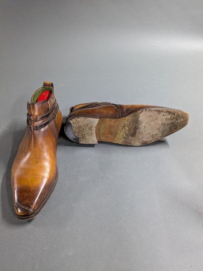 BERLUTI
Pair of men's high-top leather shoes,...