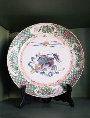 CHINA
Porcelain plate decorated with green...