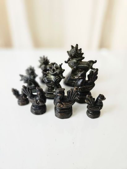 CHINA
Set of nine bronze rooster-motif w...