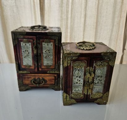 CHINA
Two small wooden cabinets, each with...