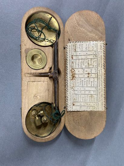 Trebuchet in its box, sundial, and folding...