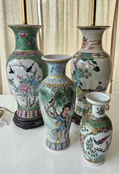 CHINA
Two green-glazed porcelain vases mounted...