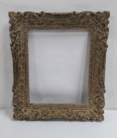 Wood and stucco frame decorated with palmettes...