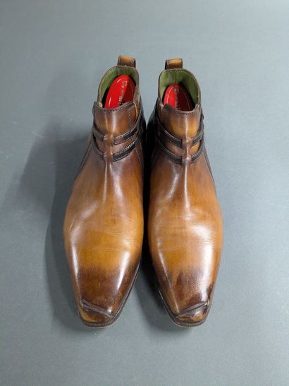 BERLUTI
Pair of men's high-top leather shoes,...