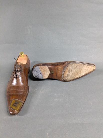 HENRIQUE HENKO
Two pairs of men's leather...