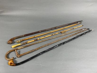 Six walking sticks with wooden pommels, made...