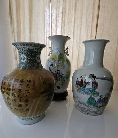 Set of three oval porcelain vases decorated...