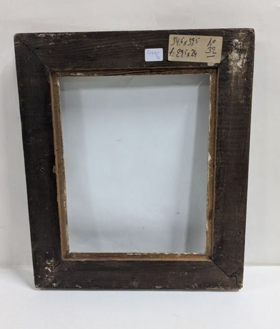 Wood and stucco frame decorated with palmettes...
