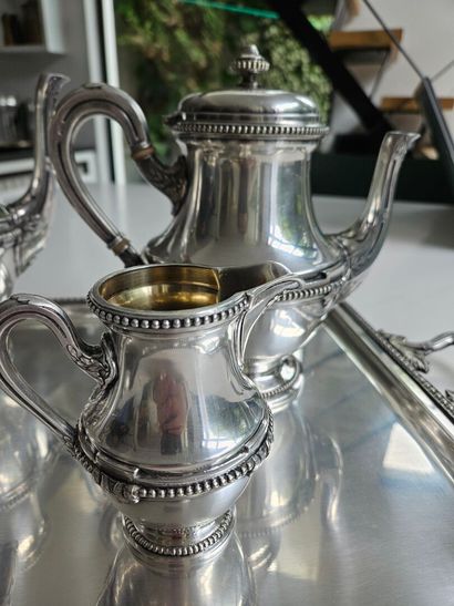 Four-piece tea and coffee set with a tray...