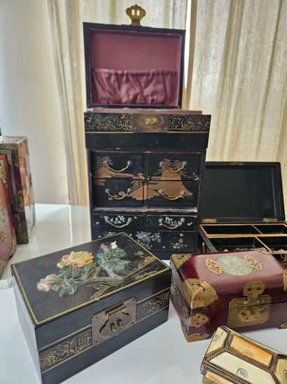 CHINA 
Set of eleven lacquered wooden boxes...
