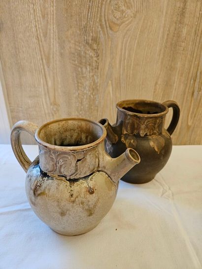 DENBAC
Two glazed stoneware pitchers sig...