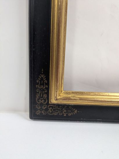 Set of two lacquered wooden frames with gold-trimmed...