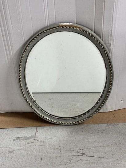 Circular lacquered wood mirror