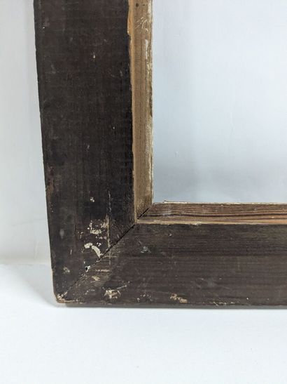 Wood and stucco frame decorated with palmettes...