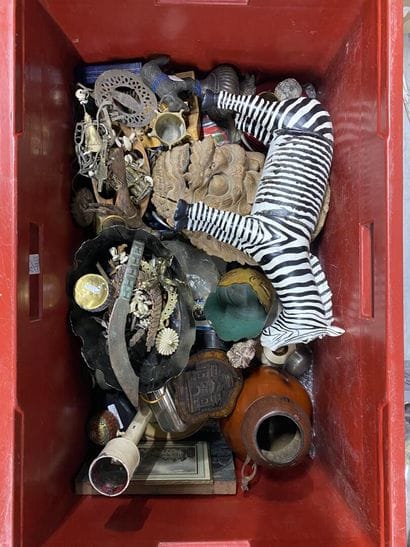 Assorted trinkets, including travel souvenirs,...