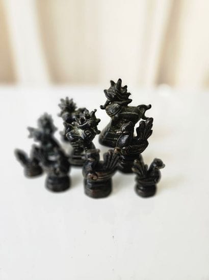 CHINA
Set of nine bronze rooster-motif w...