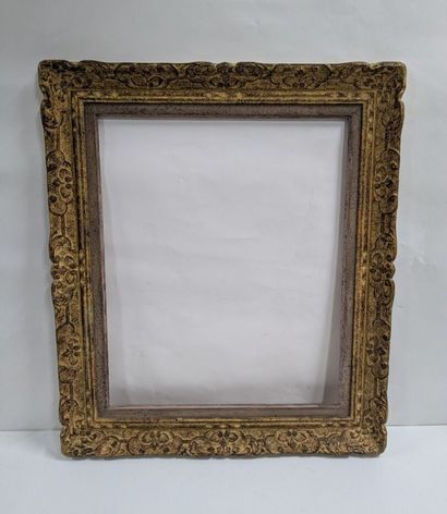 Set of two wooden and stucco frames decorated...