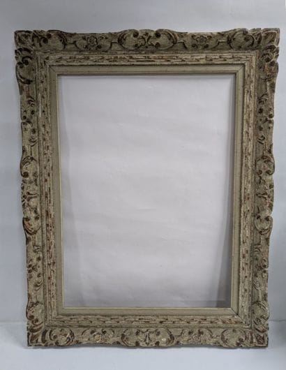 Carved wooden frame with Bérain decoration...