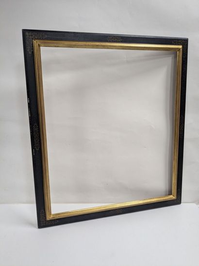 Set of two lacquered wooden frames with gold-trimmed...