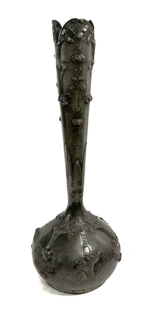 Long-necked pewter ball vase with repoussé...