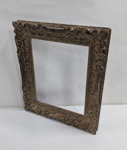 Wood and stucco frame decorated with palmettes...