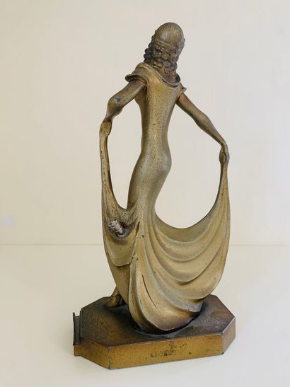 Gold-patinated alloy pyrogen depicting a...