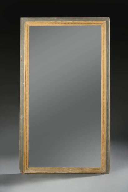 Rectangular mirror composed of a gilded carved...
