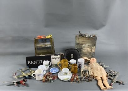 A variety of Rolls-Royce-themed trinkets,...