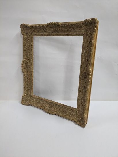 Set of two wooden and stucco frames decorated...