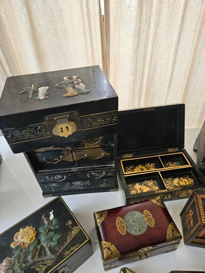 CHINA 
Set of eleven lacquered wooden boxes...