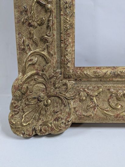 Set of two wooden and stucco frames decorated...